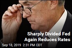 Sharply Divided Fed Again Reduces Rates