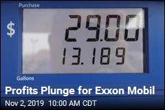 Exxon Mobil Profit Falls 49%