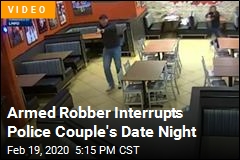 Married Officers Pause Meal to Make Armed Robbery Arrest