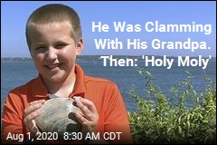 Boy Digs Up Mighty Big Mollusk While Clamming With Grandpa