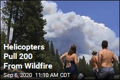 Helicopters Pull 200 From Wildfire