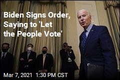 Biden Signs Order, Saying to &#39;Let the People Vote&#39;