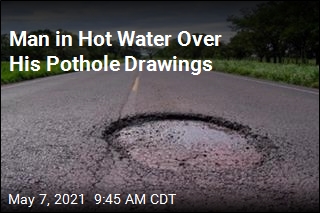 Man in Hot Water Over His Pothole Drawings