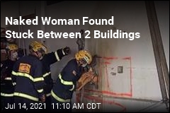 Firefighters Free Naked Woman Stuck Between Buildings