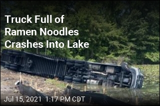 Truck Carrying 10 Tons of Noodles Crashes in Lake