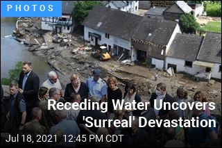 Receding Water Uncovers &#39;Surreal&#39; Devastation