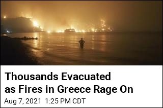 Thousands Evacuated as Fires Rampage Through Greek Forests