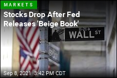 Stocks Dip After Fed Says Economy &#39;Downshifted&#39;