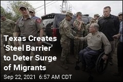 Texas Creates &#39;Steel Barrier&#39; to Deter Surge of Migrants