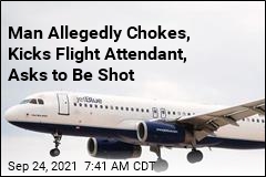 Man Allegedly Chokes, Kicks Flight Attendant, Asks to Be Shot