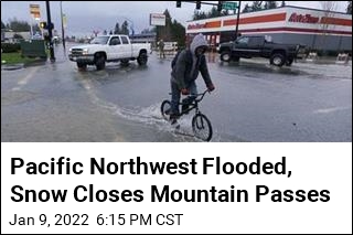 Pacific Northwest Flooded, Snow Closes Mountain Passes