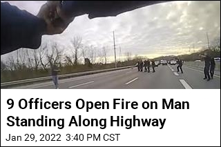 9 Officers Open Fire on Man Standing Along Highway
