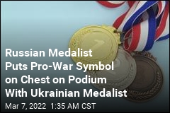 Russian Medalist Puts Pro-War Symbol on Chest, Stands Next to Ukrainian Medalist