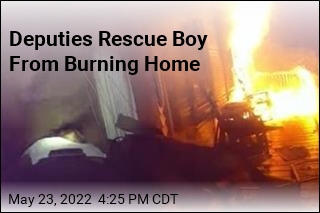 Deputies Rescue Boy From Burning Home