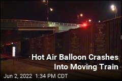 Hot Air Balloon Crashes Into Moving Train