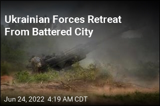 Ukrainian Forces Retreat From Battered City