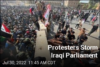 Cleric&#39;s Followers Storm Iraqi Parliament