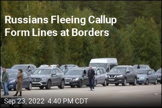 Russians Fleeing Callup Form Lines at Borders
