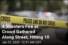 4 Shooters Fire at Crowd Gathered Along Street, Hitting 10