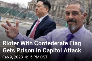 Rioter With Confederate Flag Gets Prison in Capitol Attack