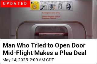 Prosecutors: Passenger Tried to Open Jet&#39;s Door During Flight