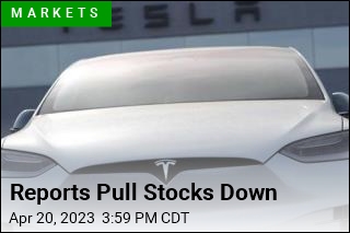 Tesla, AT&amp;T Pull Stocks Down