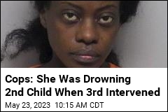 Cops: She Was Drowning 2nd Child When 3rd Intervened