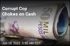 Corrupt Cop Chokes on Cash