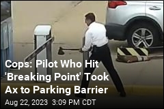 Cops: Pilot Who Hit &#39;Breaking Point&#39; Took Ax to Parking Barrier