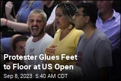 Protester Glues Feet to Floor at US Open