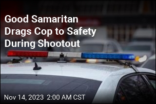 Good Samaritan Drags Cop to Safety During Gunfight