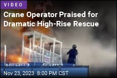 Crane Operator Rescues Man From Burning High-Rise