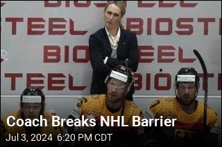 Coach Breaks NHL Barrier