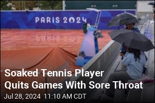 Soaked Tennis Player Quits Games With Sore Throat