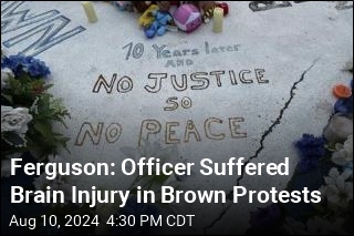 Ferguson Chief: Officer Was Critically Injured in Protest