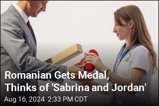 Romanian Gets Medal, Thinks of &#39;Sabrina and Jordan&#39;