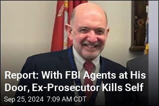 Report: Ex-Prosecutor Kills Self After Firing at Federal Agents