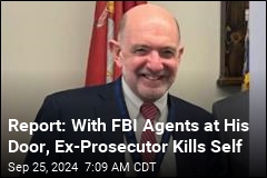 Report: Ex-Prosecutor Kills Self After Firing at Federal Agents