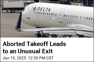 Passengers Exit on Slides After Aborted Delta Takeoff