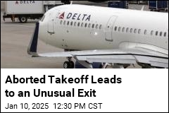 Passengers Exit on Slides After Aborted Delta Takeoff