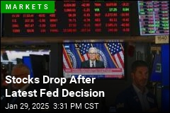 Stocks Drop After Fed Keeps Rates Steady