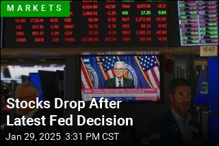 Stocks Drop After Fed Keeps Rates Steady