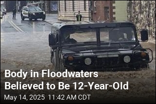 Body in Floodwaters Believed to Be 12-Year-OId