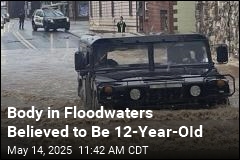 Body in Floodwaters Believed to Be 12-Year-OId