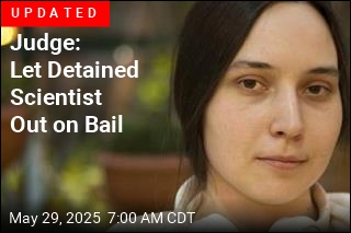 DOJ: Scientist&#39;s Texts on Frog Embryos Did Her In