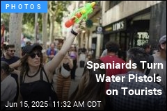 Protesters Spritz Tourists