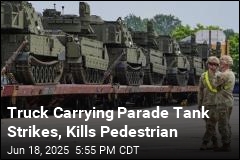 Woman Dies After Being Hit by Truck Returning Parade Tank