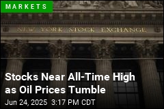 Stocks Near All-Time High as Oil Prices Tumble
