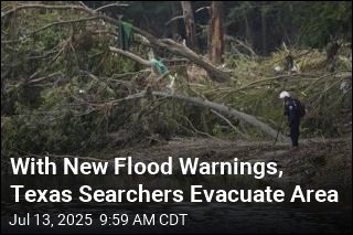 With New Flood Warnings, Texas Searchers Evacuate Area
