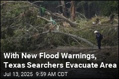 With New Flood Warnings, Texas Searchers Evacuate Area